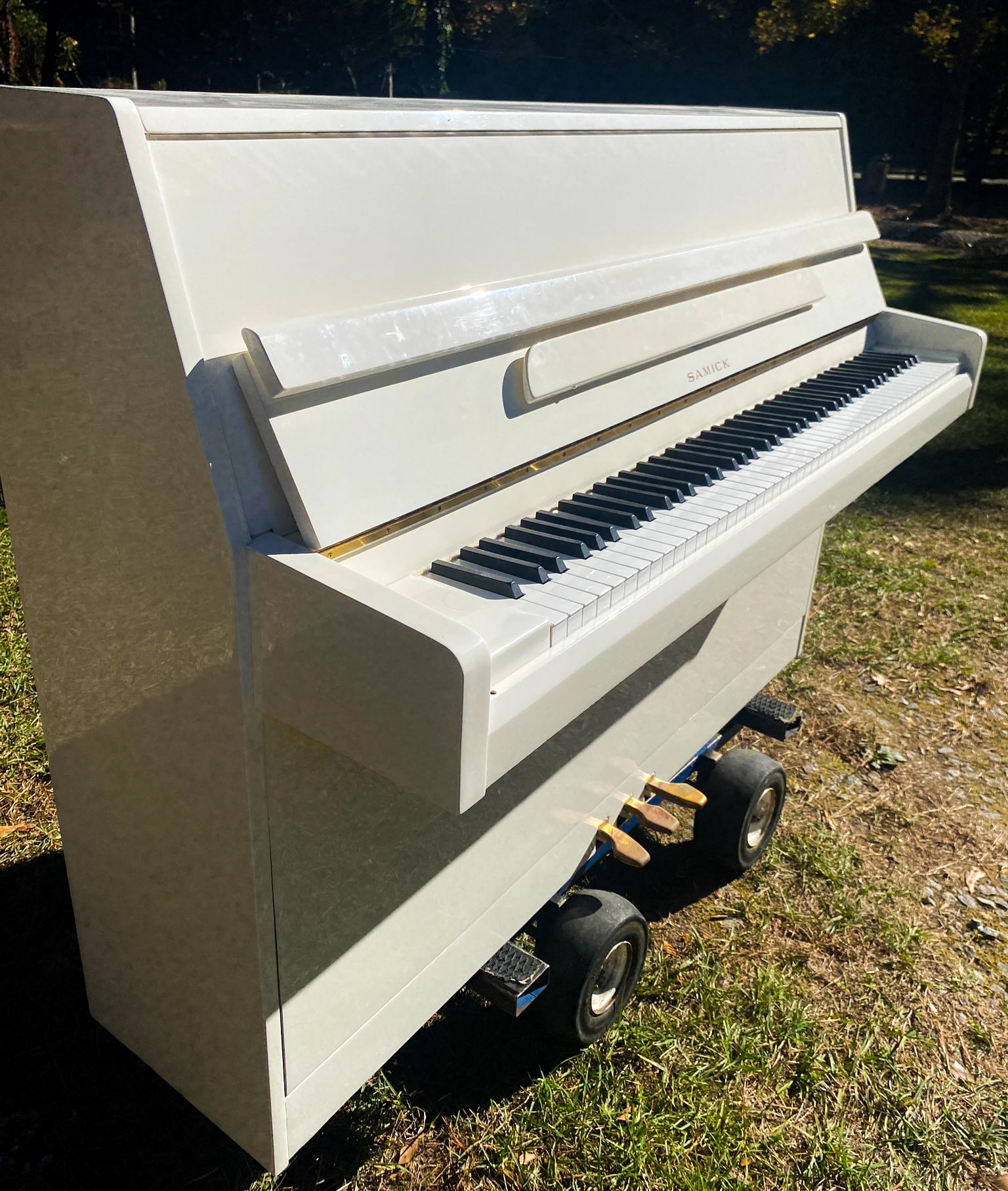 A cute white Samick piano